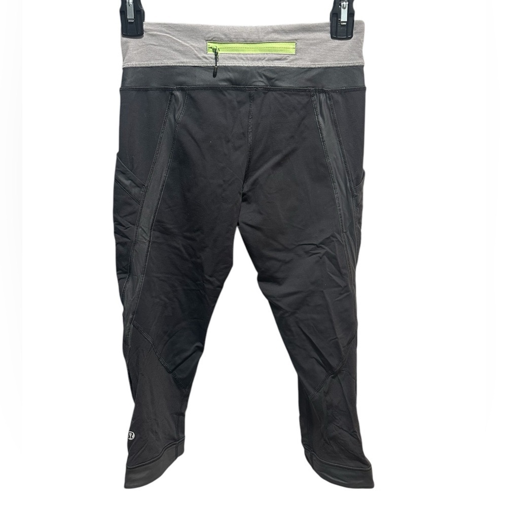 LULULEMON BLACK GRAY AND GREEN CROPPED LEGGINGS WITH POCKETS SIZE 4 - Picture 2 of 4